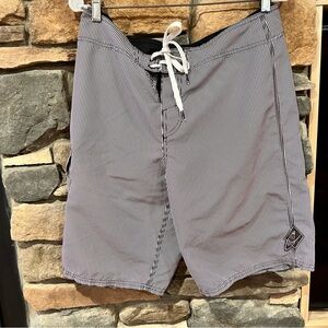 O’Neill’s purple, off-white,‎ White Striped Swim Shorts.